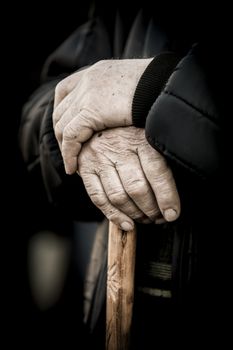 Old people, hands on a cane as main concept, France