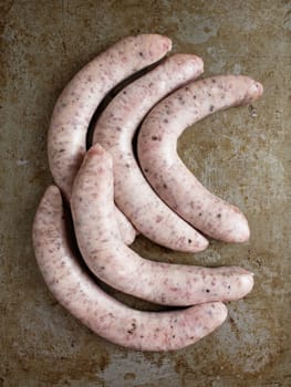 close up of rustic uncooked italian pork sausage