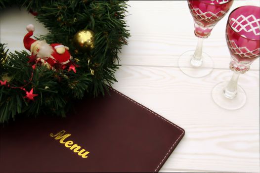 Christmas menu card on a light wooden background