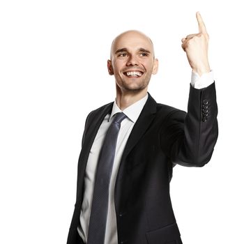 Studio shot of happy young man gesturing with his hand. 