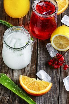 glass of medicinal drink sap from aloe leaf and orange