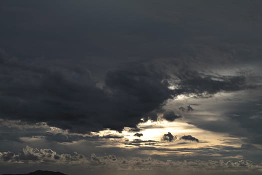 Background of the sky with cloud at sunset, dramatic evening cloudscape over sea