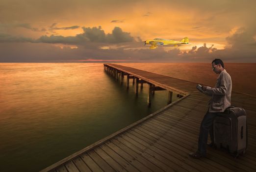 man waiting for plane fligh on pier use for traveling theme