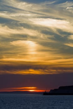 Sunset at Newhaven, with clouds and Newhaven Lighthouse.