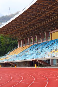 plastic seats in stadium at day