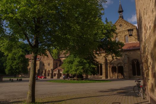 MAULBRONN, GERMANY - MAI 17, 2015: row of Tudor style houses at the monastery courtyard in Maulbronn. Cistercian Monastery Maulbronn is part of the UNESCO World Heritage Site.