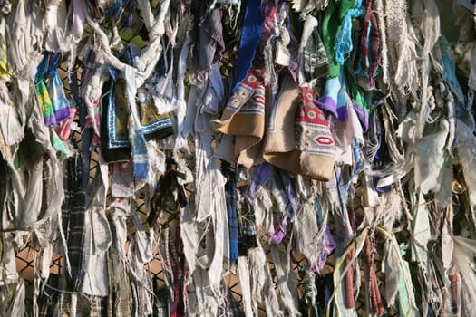 Close up of lots of Buddhist ribbons fluttering in the wind