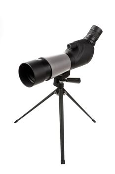 the telescope on a support on the isolated white background