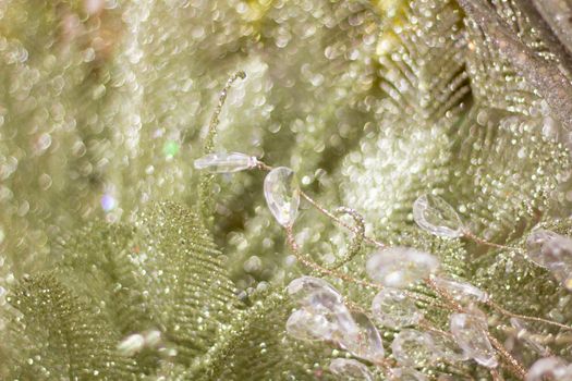 Bright shiny golden and silver leaves and drops background for celebration greeting cards