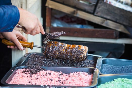 pastries sprinkled with chocolate flakes during cooking