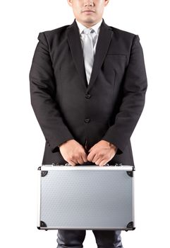 young business man holding strong metal briefcase in hand isolated white background