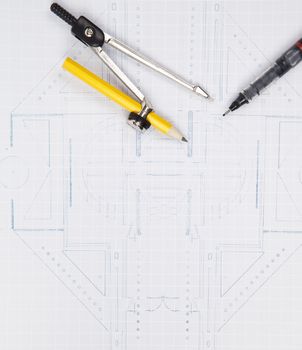 compass and writing pen on architect plan for construction industries theme