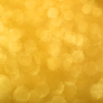 Abstract gold bokeh background of glowing lights, party, holiday, christmas