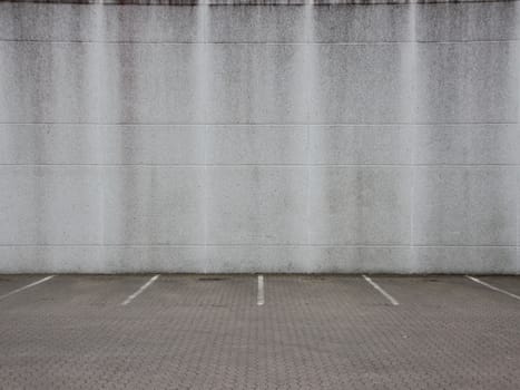 Empty Grey Urban Ghetto Parking Lot with Concrete Wall