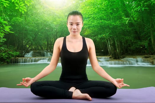 beautiful asian woman doing meditation yoga