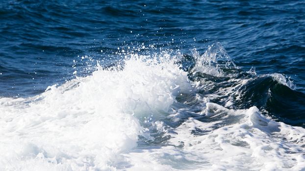 Wave of a ferry ship on the open ocean (Atlantic Ocean, Iceland)