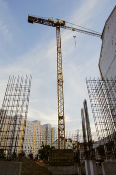Construction site with crane and building, View from bottom