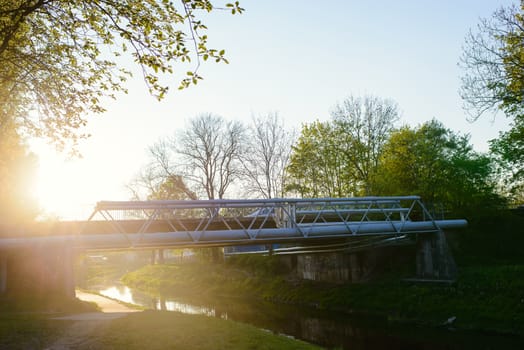 Small bridge in the city in spring