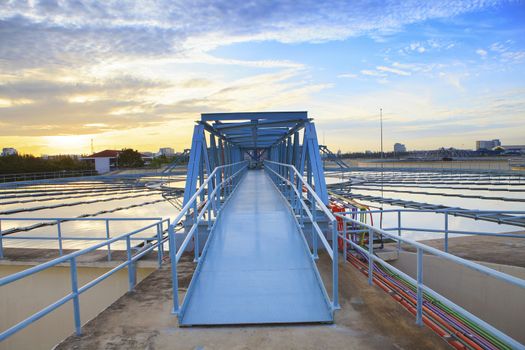 perspective of metal bridge for working in big tank of water supply in metropolitan water works industry plant site 