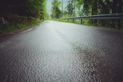 asphalt road in mountain in summer time