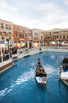 COTAI STRIP MACAU CHINA-AUGUST 22 visitor on gondola boat in Venetian Hotel The famous shopping mall luxury hotel landmark and the largest casino in the world on august 22,2014 in Macau China 