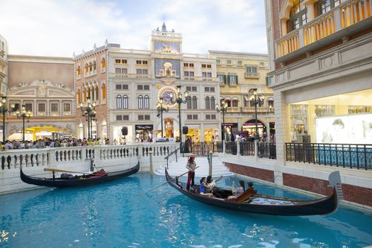 COTAI STRIP MACAU CHINA-AUGUST 22 visitor on gondola boat in Venetian Hotel The famous shopping mall luxury hotel important landmark and the largest casino in the world on august 222014 in Macau China