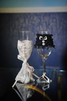 Decorated wedding glasses bride and groom