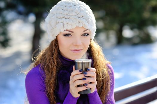 Winter woman with hot coffee 