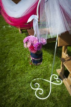 wedding decoration of flowers on a green lawn