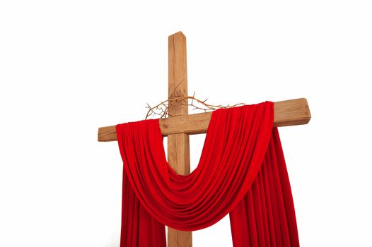 A wooden christian cross with a crown of thorns isolated on white background