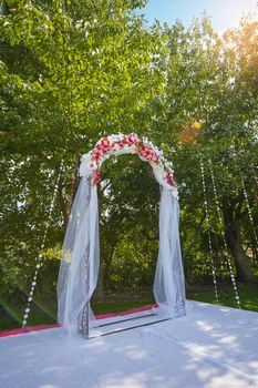 Arch for the wedding ceremony. Floristic composition in vintage style. The Provence. 
