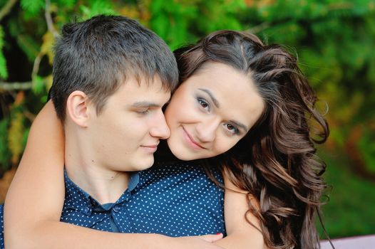 Young happy smiling attractive couple together outdoors 