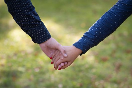 Happy couple holding hands 