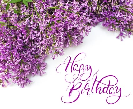Beautiful lilac branch isolated on white background spring with text Happy Birthday. Calligraphy lettering.