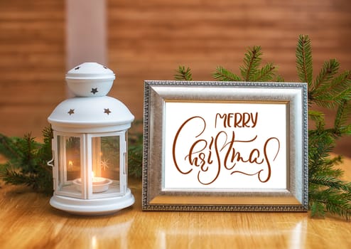 Holiday background - candlestick and frame with text Merry Christmas. Calligraphy and lettering.