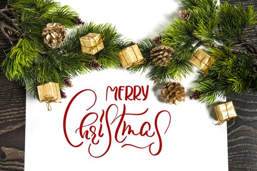 background for winter holidays greeting card with text Merry Christmas. Calligraphy and lettering.