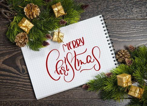 Christmas blank note with text Merry Christmas. Calligraphy and lettering.