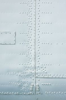 texture of covering the plane with buttons background