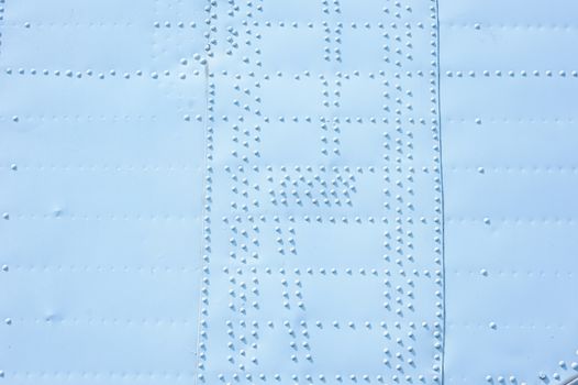 texture of covering the plane with buttons background