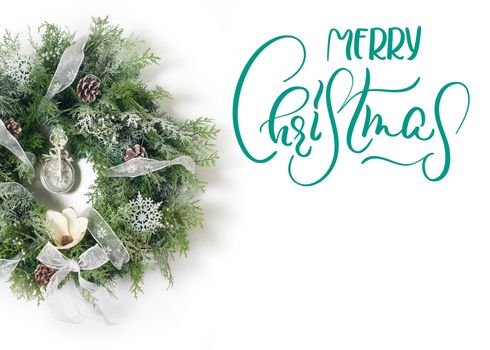 Christmas wreath on white background. Calligraphy lettering.