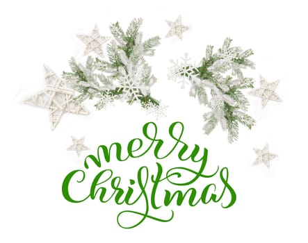 Fir branches in the snow on a white background and text of Merry Christmas. lettering calligraphy.