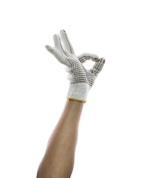 male hand wearing clothes hand glove sign o.k. use for construction craft home work and related occupation 