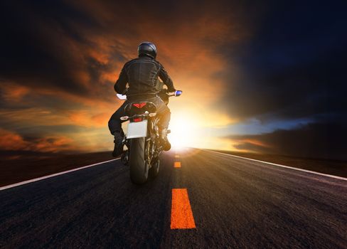 young man riding big motorcycle on asphalt highway use for people leisure and motorsport activities