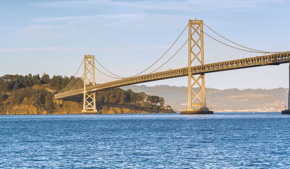 Bay Bridge at sunset in a warm autumnal day