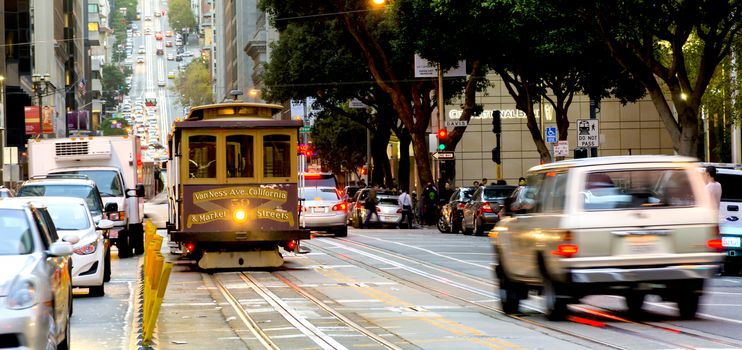 San Francisco, CA, USA, october 22, 2016; traditional Cable car in the traffic of San Francisco