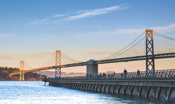 Bay bridge at sunset in a clear day