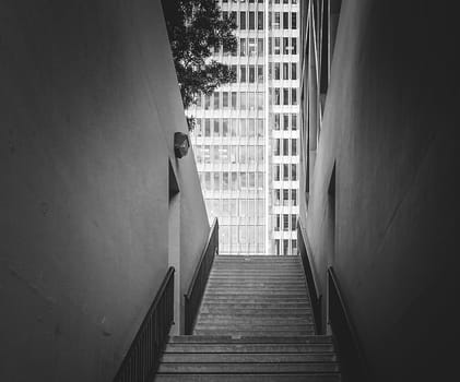 stairs and a building facade ar top