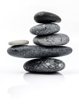 The stack of Stones spa treatment scene zen like concepts. The stack of Stones spa isolated on white background. 