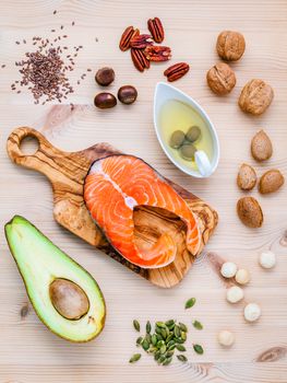 Selection food sources of omega 3 and unsaturated fats. Super food high omega 3 and unsaturated fats for healthy food. Almond ,pecan ,hazelnuts,walnuts ,olive oil ,fish oil ,salmon and avocado .
