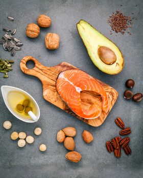 Selection food sources of omega 3 and unsaturated fats. Super food high omega 3 and unsaturated fats for healthy food. Almond ,pecan ,hazelnuts,walnuts ,olive oil ,fish oil ,salmon and avocado .
